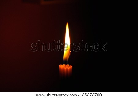 orange candle light stock photo