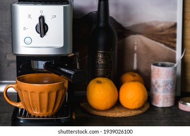 Orange Cappuccino Cup On Modern Coffee Machine. Coffee Station At Home