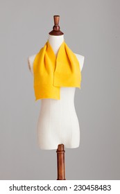 Orange Cashmere Neckerchief With Wood Model On Grey Isolated