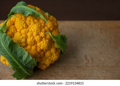 Orange Cauliflower On Wooden Floor, Winter Vegetable