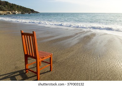 Orange Chair On The Beach