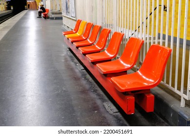 Orange Chairs In The Subway In Paris.