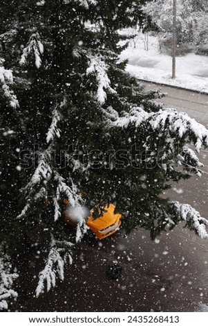 Orange chevrolet car in snow