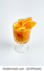 Orange Cocktail In A Glass, White Background, Product Photography