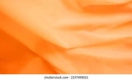 Orange Color Cloth Pattern Background,Silk Wave Texture Design Backdrop,Card Poster Or Banner,Light Gradient Fabric Smooth Shape Colorful,Abstract Luxury Green Template Wallpaper,free Space Top View.