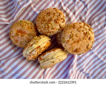 Orange Color Pumpkin Flavor Macarons Textured With Sesame Seeds