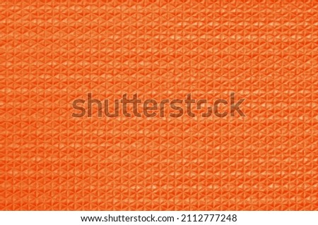 Orange color rubber texture background with seamless pattern.