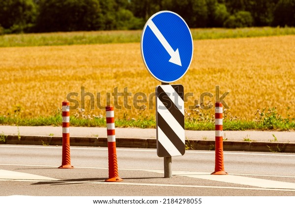 Orange cones and road signs for traffic control,\
road marking