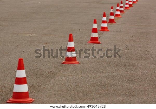 orange cones set up to\
direct traffic