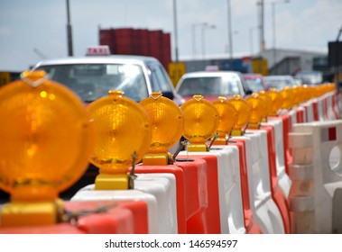 Orange Construction Light On Barricade 