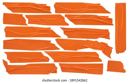 Orange construction scotch, shiny sticky strips of stationery tape, self-adhesive tape set of various sizes isolated on white background