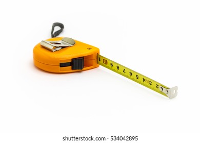 Orange Construction Tape Measure Closeup On White Background.