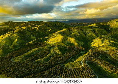 Orange County Landscape After Rainy Season In Southern California - Rare Aerial View Of The Rolling Green Santa Ana Mountains Between Storms At Sunset 