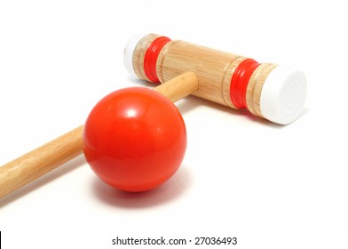 Orange Croquet Mallet And Ball Isolated On White