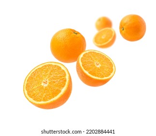 Orange with cut in half levitate isolated on white background. - Powered by Shutterstock