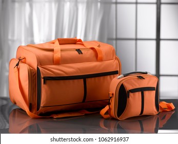 Orange Duffel Bag And Handbag