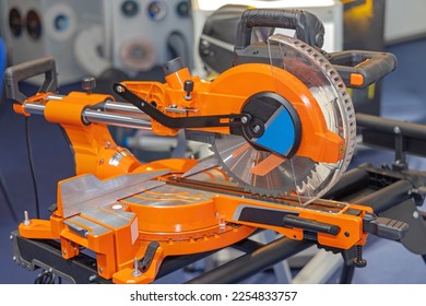 Orange Electric Mitre Circular Saw With Laser Guide Equipment - Shutterstock ID 2254833757