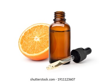Orange essential oil with orange fruit  
 sliced isolated on white background.