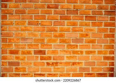 Orange Exposed Brick Wall Background