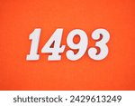 Orange felt is the background. The numbers 1493 are made from white painted wood.