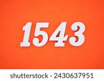 Orange felt is the background. The numbers 1543 are made from white painted wood.