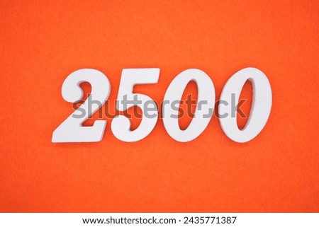 Orange felt is the background. The numbers 2500 are made from white painted wood.
