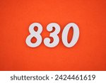 Orange felt is the background. The numbers 830 are made from white painted wood.