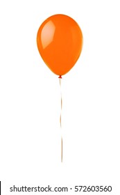 Orange flying balloon isolated on white background 