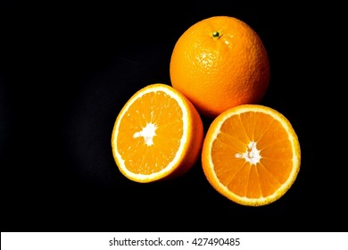 Orange Fruit On Black Background