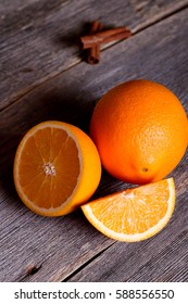 Orange Fruit On Wooden Table Background, Close Up, Vertical