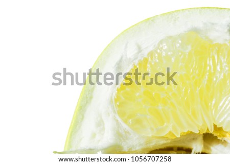 Orange fruit. Orang slice isolate on white. A slice of yellow orange pamela macro. Cages of fresh citrus fruit