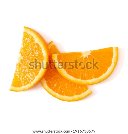 Orange fruit slice layout isolated over white background closeup. Food background. Flat lay, top view.