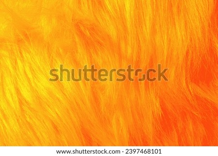 Orange fur texture. orange sheepskin background. texture of pink shaggy fur. Wool texture.