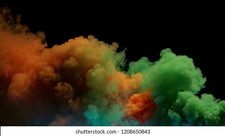 Orange And Green Bomb Smoke On Black Background