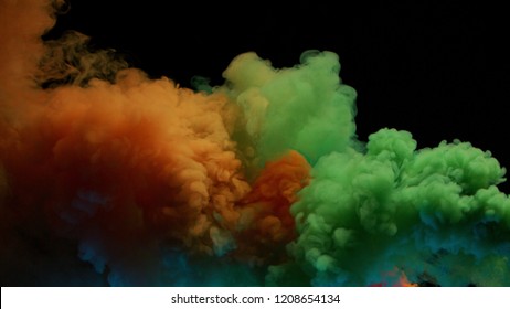 Orange And Green Bomb Smoke On Black Background