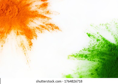 Orange And Green Color Powder Splash. Concept For India Independence Day, 15th Of August.