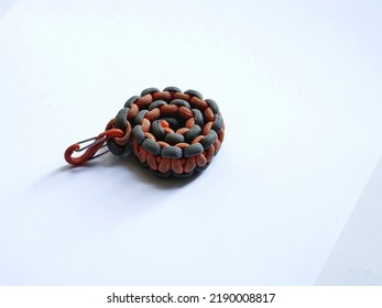 Orange and grey paracord bracelet for survival condition - Powered by Shutterstock