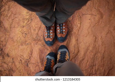 Orange Hicking Boots On Ochre Ground 