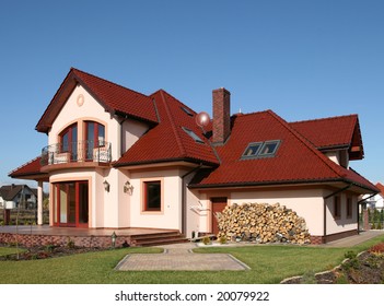 Orange home with red tiled roof. Nice architecture.