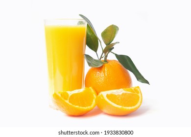 Orange juice glass with whole orange, slices and leaves isolated on white background. - Powered by Shutterstock