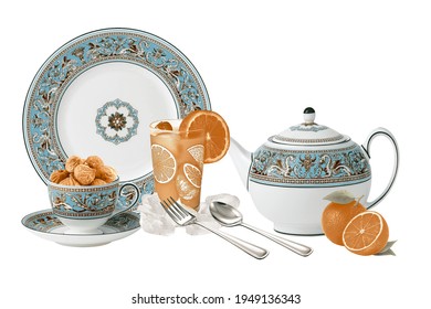 Orange juice with ice cubes and spoon kitchen, cup with nuts and dish, teapots with orange and white background - Shutterstock ID 1949136343