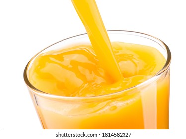 Orange juice pouring into glass isolated on a white background - Powered by Shutterstock