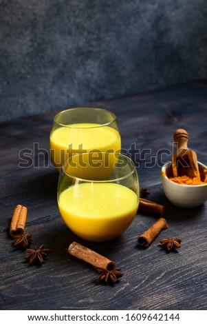 orange juice with spices, alcoholic cocktail in round glasses, selective focus