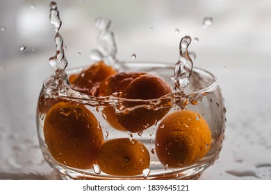 Orange Kumquat Fruit Falls At High Speed Into A Glass Container To Make Sweet Or Jam Cordoba Argentina