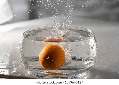 Orange Kumquat Fruit Falls At High Speed Into A Glass Container To Make Sweet Or Jam Cordoba Argentina