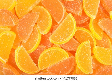 Orange And Lemon Candy Slices As Background Texture