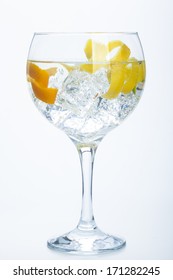 Orange Lemon And Lime Gin Tonic Isolated Over White Background