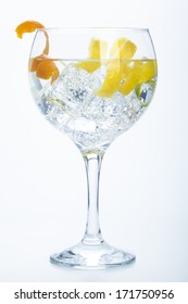 Orange Lemon And Lime Gin Tonic Isolated Over White Background