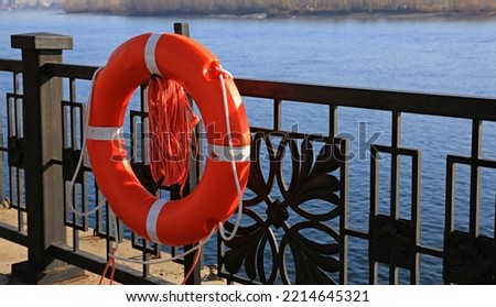 orange life buoy on board