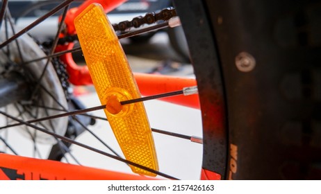 Orange Light Reflector In Bicycle Tire